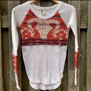 Rare Free People Long Sleeve Top with Red Ram and White Design thermal knit